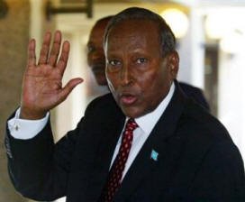 Somalia's new president Abdullahi Yusuf Amed waves, Friday, Nov. 19, 2004,  after he asked the U.N. Security Council, meeting in an extraordinary session in Africa, for financial and political support for a major peacekeeping operation to bring stability to his anarchic nation.(AP Photo/Karel Prinsloo)